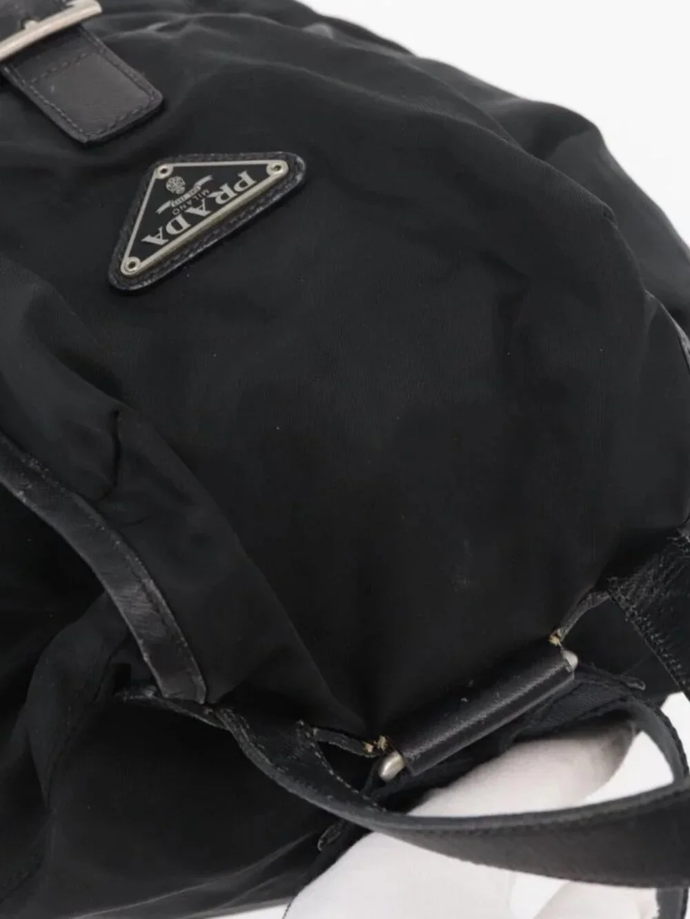 Prada brand	prada color	black